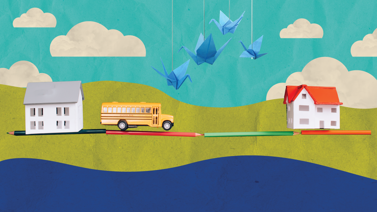 Artistic cutouts of houses, a school bus, origami birds