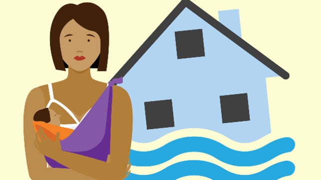 Woman breastfeeding a baby with image of a house flooded in background.
